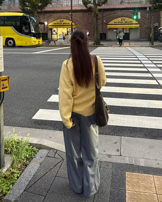V-neck ribbed hem loose sweater
