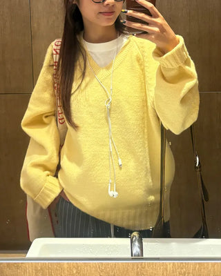 V-neck ribbed hem loose sweater