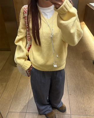 V-neck ribbed hem loose sweater