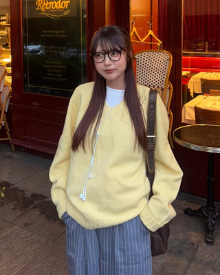 V-neck ribbed hem loose sweater