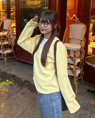 V-neck ribbed hem loose sweater