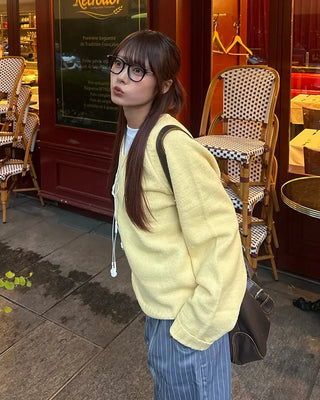 V-neck ribbed hem loose sweater