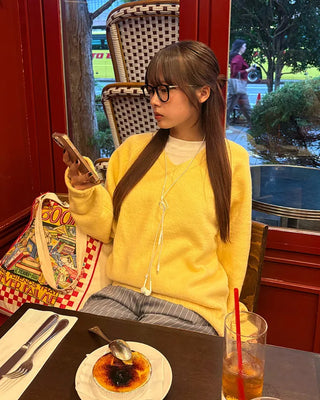 V-neck ribbed hem loose sweater