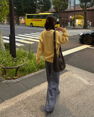 V-neck ribbed hem loose sweater