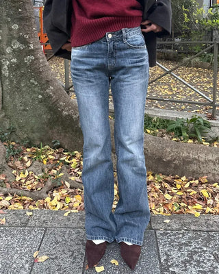 Low-waist point-washed flare jeans