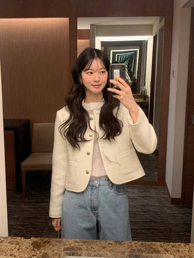 Collarless tweed jacket
