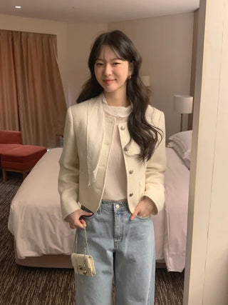 Collarless tweed jacket