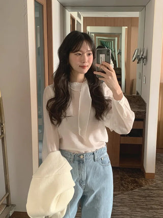 Sheer blouse with tie