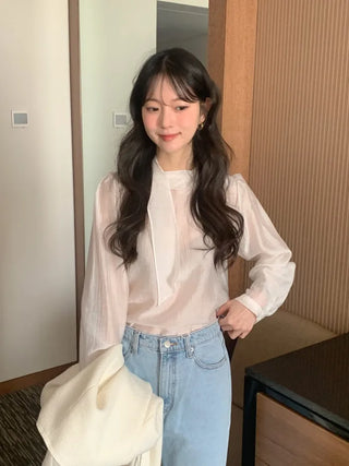 Sheer blouse with tie