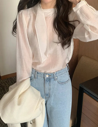 Sheer blouse with tie
