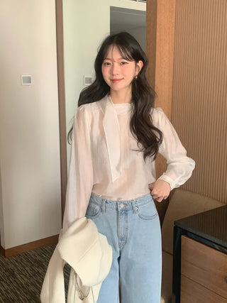 Sheer blouse with tie