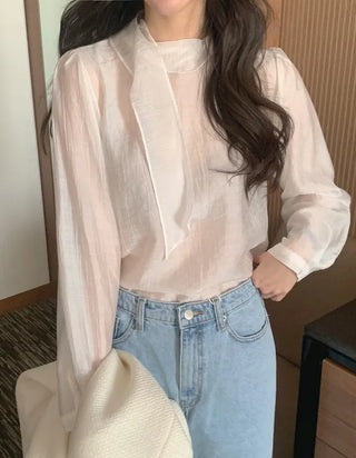 Sheer blouse with tie