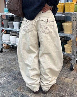 Cross-stitch flap pocket striped cotton pants