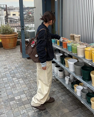 Cross-stitch flap pocket striped cotton pants