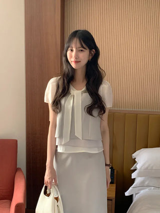 Short-sleeved blouse with tie