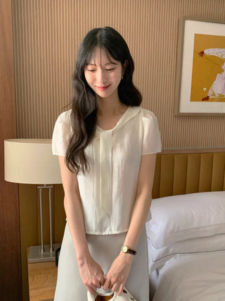 Short-sleeved blouse with tie