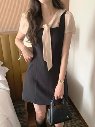 Short-sleeved blouse with tie
