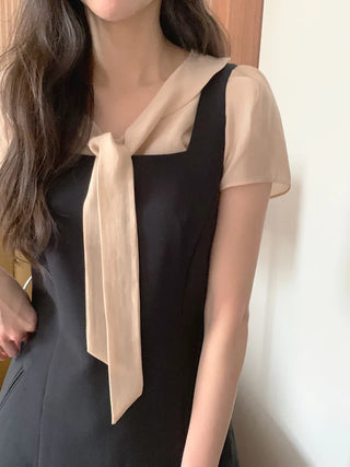 Short-sleeved blouse with tie