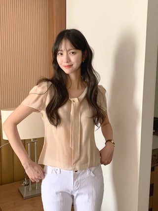 Short-sleeved blouse with tie