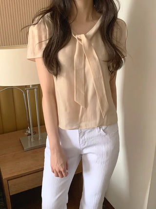Short-sleeved blouse with tie