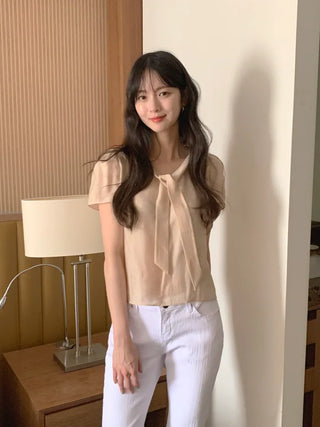 Short-sleeved blouse with tie