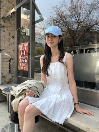 Deep pleated bustier dress
