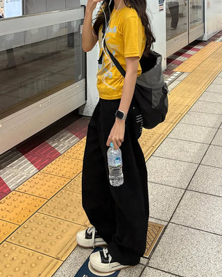 Cross-studded wide cotton pants with hip pockets