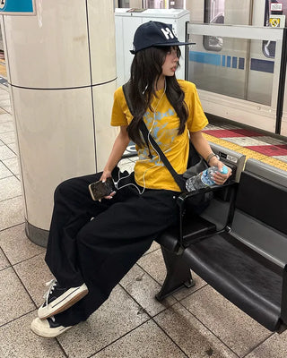 Cross-studded wide cotton pants with hip pockets