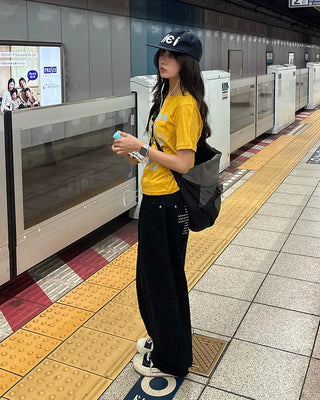 Cross-studded wide cotton pants with hip pockets