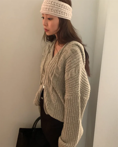 Loose-fit twisted knit hoodie