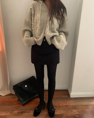 Loose-fit twisted knit hoodie