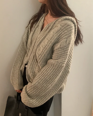 Loose-fit twisted knit hoodie