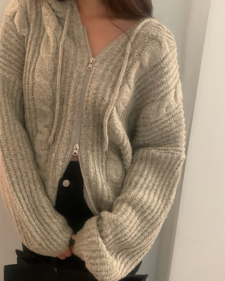 Loose-fit twisted knit hoodie