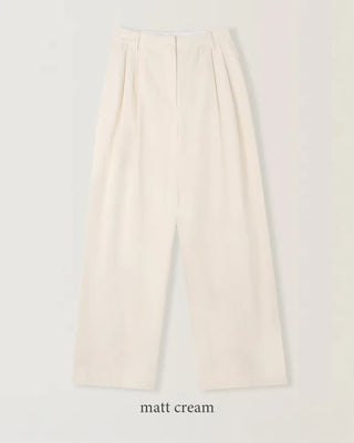 Wide cotton slacks with pleats