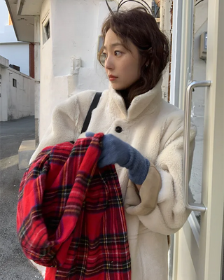Reversible suede shearling coat