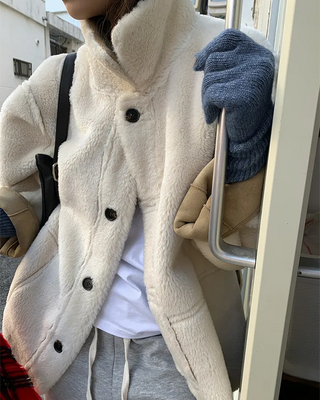 Reversible suede shearling coat