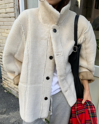 Reversible suede shearling coat