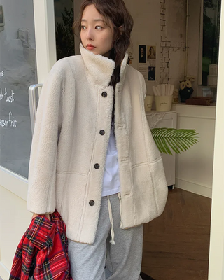 Reversible suede shearling coat