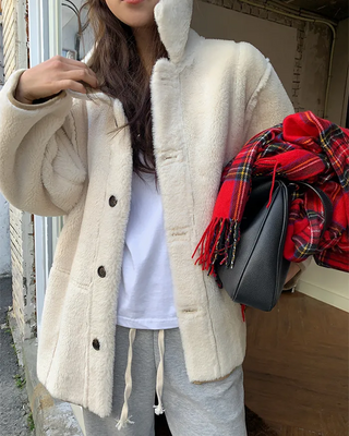 Reversible suede shearling coat