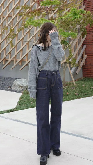 Pocket-stitched bootcut low-rise denim