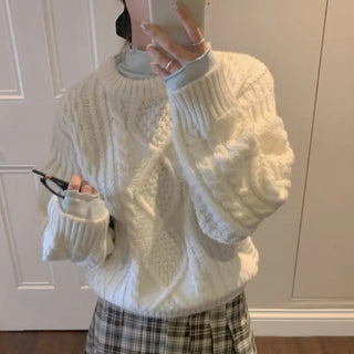 Loose-fit wool twist cable knit sweater