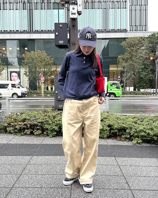 Cotton pants with side buckle patches