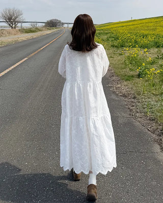 Long dress with neck lace detail and ruffles