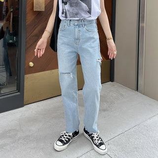 Distressed denim pants