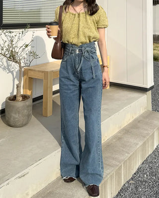 Strap high-waisted denim pants