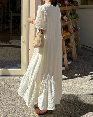 Long dress with ruffled hem
