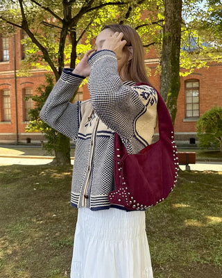 Studded suede shoulder bag