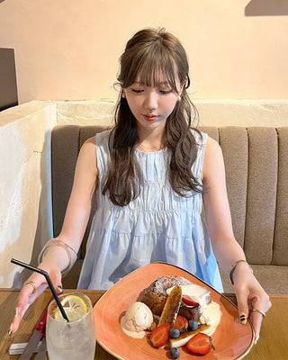 Shirred sleeveless blouse