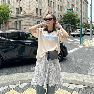 Pleated check midi skirt