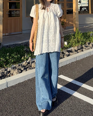 High-waisted denim pants with button strings